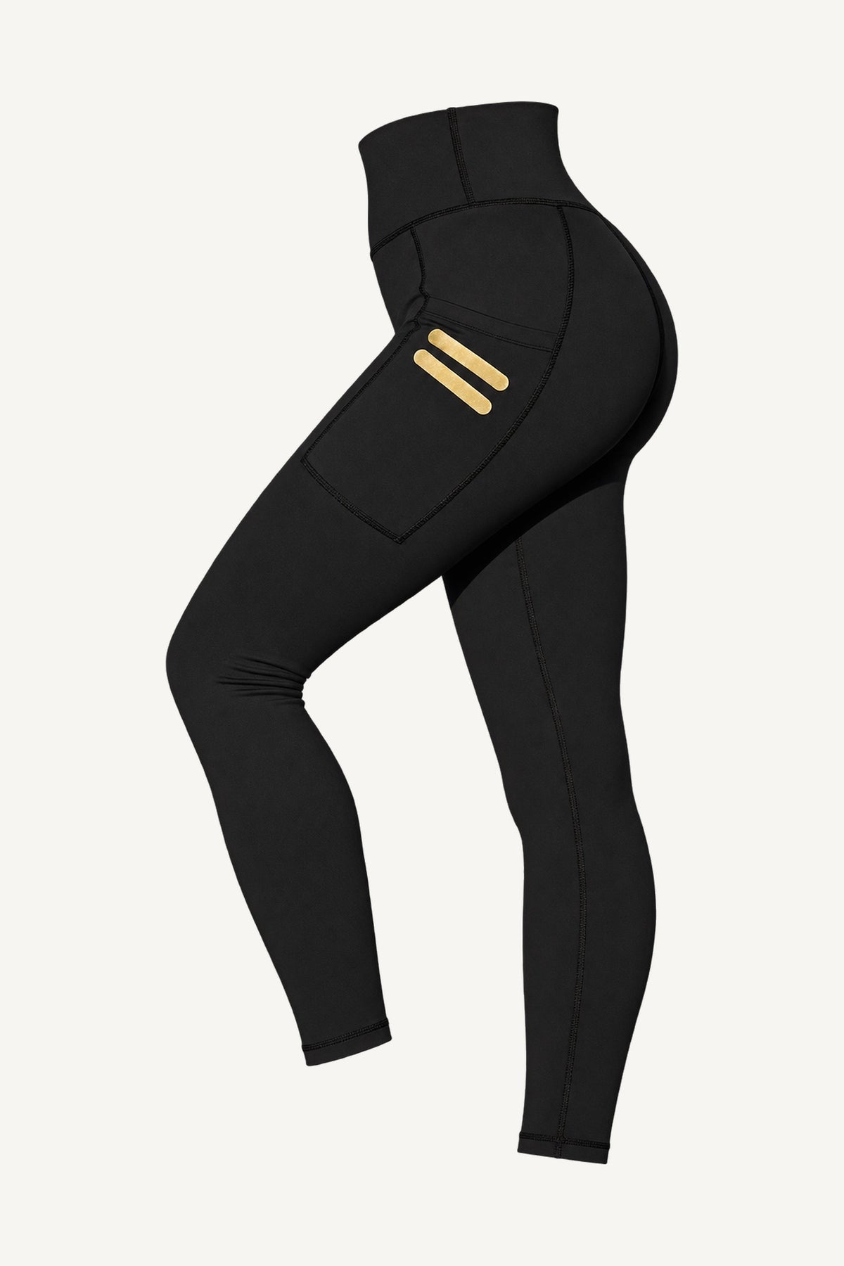 Iconic Stripe Tights Med Fickor cut out, at an angle from the front. Pockets on both legs with two short gold lines.
