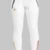White joggers with gold zippers in sides