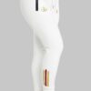 White joggers with gold zippers in sides