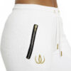 White joggers with gold zippers in sides